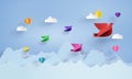 Origami made colorful paper bird flying on blue sky . paper art and craft style. Royalty Free Stock Photo