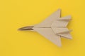 Origami paper airplane mockup. Selective focus. Bright yellow Royalty Free Stock Photo