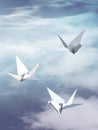 Origami paper bird fly in the sky