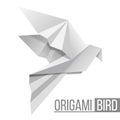 Origami paper bird. Flying pigeon isolated on white Royalty Free Stock Photo