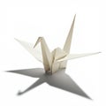 Origami paper crane, expertly folded, made from plain white paper. Sharp, angular lines Royalty Free Stock Photo