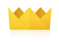 Origami paper crown golden on a white background Royalty Free Stock Photo