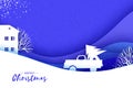 Origami paper cut car with Christmas tree on blue. Merry Christmas and Happy New Year. Origami Winter Landscape. Village Royalty Free Stock Photo