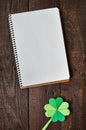 Origami paper green clover shamrock leaf on dark barn wood background Royalty Free Stock Photo