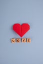 Origami paper heart and word love. on blue background. Valentine`s Day background. Valentines day, Royalty Free Stock Photo