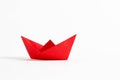 Origami red paper boat on white background Royalty Free Stock Photo