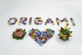 Origami sign and heart creative concept made of bunch of multi colored origami stars