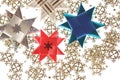 Origami stars postcard on the snowflake garland