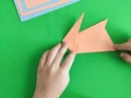 Origami step by step. How to make a paper bunny for Easter greetings