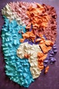 origami world map created from folded paper