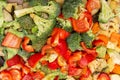 An original background of finely chopped and seasoned vegetables before baking in the oven. Potatoes, bell peppers, squash, Royalty Free Stock Photo