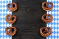 Original Bavarian Pretzels on Wooden Board. Oktoberfest Background