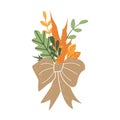 Original bouquet of ripe carrots and autumn fallen leaves