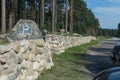 Original car parking sign painted on a huge stone