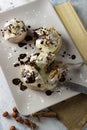 Original cinnabon rolls with chocolate-cream sauce and hazelnuts Royalty Free Stock Photo