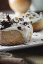 Original cinnabon rolls with chocolate-cream sauce and hazelnuts Royalty Free Stock Photo