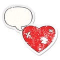 A creative cartoon beaten up heart and speech bubble distressed sticker Royalty Free Stock Photo