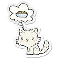 A creative cartoon cat and food and thought bubble as a printed sticker Royalty Free Stock Photo