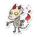A creative distressed sticker of a cartoon spooky demon Royalty Free Stock Photo