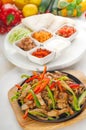 Original fajita sizzling hot on iron plate Royalty Free Stock Photo