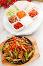 Original fajita sizzling hot on iron plate