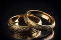 Original gold wedding rings on a dark background. Neural network AI generated