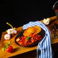 Original Hungarian goulash with potato pancakes Royalty Free Stock Photo