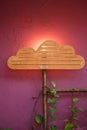 Original interior with wooden cloud and sun lamp