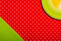 Original kitchen textile with texture geometric graphic background bright red with white polka dots with a napkin and an empty Royalty Free Stock Photo