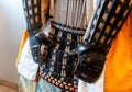 Original medieval japanese samurai armor yoroi in the museum. Hands protection. Details close up