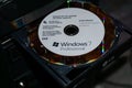 WILDFLECKEN, BAVARIA, GERMANY - JANUARY 11, 2020 An original Microsoft Windows 7 DVD in a DVD drive