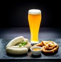 Original Munich sausage with Hefeweizen and pretzel Royalty Free Stock Photo