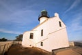 ORIGINAL OLD POINT LOMA LIGHTHOUSE UNDER CIRRUS CLOUD SKIES AT POINT LOMA SAN DIEGO CALIFORNIA USA Royalty Free Stock Photo