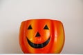 Original orange flowerpot container halloween for a bright back