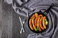 Original pork sausage links fried on a skillet