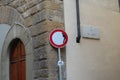 Original road signs in Florence, Italy. Social art of the artist Clet Abraham. Attracts the attention of drivers and tourists.