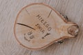 Original round mug coaster made of birch wood with a positive inscription in Polish