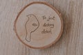 Original round mug coaster made of birch wood with a positive inscription in Polish