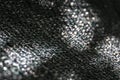 The original texture of the woven network or black nylon net with bokeh and sunlight spots Royalty Free Stock Photo