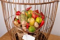 The original unusual edible vegetable and fruit bouquet with card in bird cage Royalty Free Stock Photo