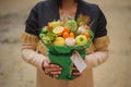 The original unusual edible vegetable and fruit bouquet with card in woman hands Royalty Free Stock Photo