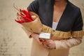 The original unusual edible vegetable and fruit bouquet with card in woman hands Royalty Free Stock Photo