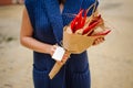 The original unusual edible vegetable and fruit bouquet with card in woman hands Royalty Free Stock Photo