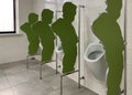 Original Urinal In A Public Restroom. Partitions For Toilet And Toilet In The Men`s Room