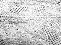 Original vector grunge texture of a lot of car tire prints on the sand. Distress texture for overlay, stencil. Design element Royalty Free Stock Photo