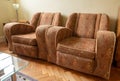 Matching pair of original vintage upholstered deco 1930s armchairs.