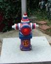 Very patriotic fire hydrant, red, white, blue Royalty Free Stock Photo