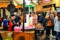 Orihuela, Spain, January, 2020: The seller of cotton candy at work. Sale of cotton candy on holiday