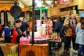 Orihuela, Spain, January, 2020: The seller of cotton candy at work. Sale of cotton candy on holiday