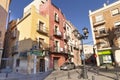 Orihuela, Spain - November 16, 2019: Empty street in old Spanish town with colorful buildings